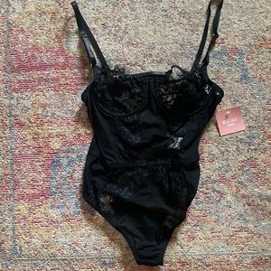Miss Lola Black Bodysuit